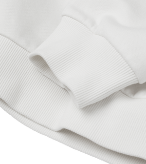 Close-up of the ribbed collar detail on the white Big Fred Golf crewneck sweatshirt, showcasing premium stitching and fabric quality.